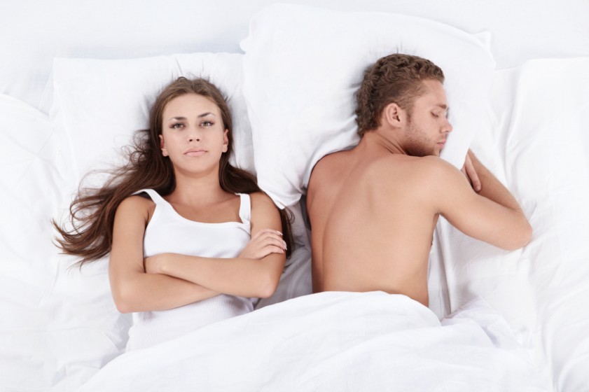 Couple lying in bed