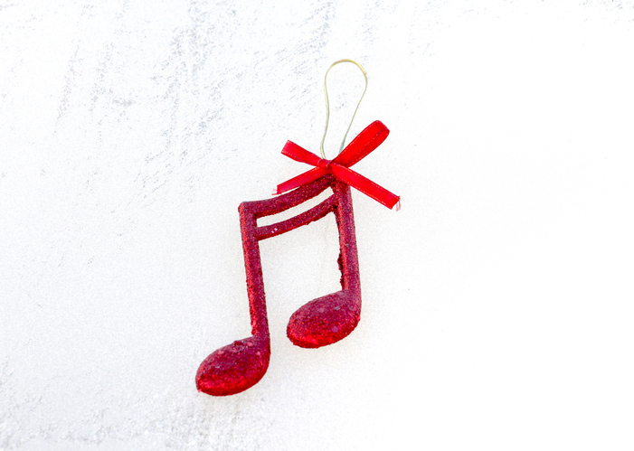 picture of a red shiny decorative christmas music notes