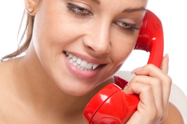 Woman on red telephone