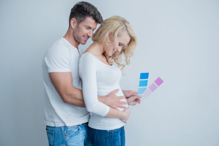 Man behind his pregnant partner
