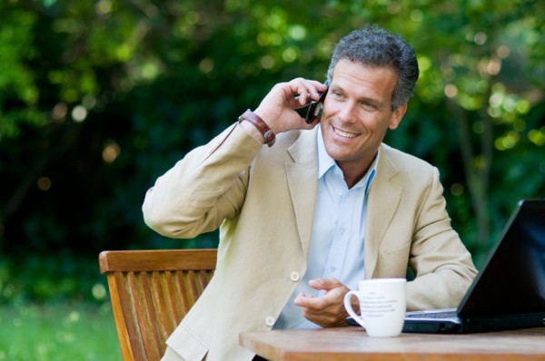 Man on the phone in garden