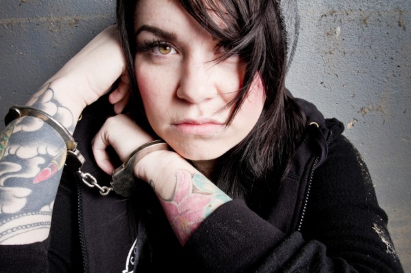A Teen girl in handcuffs